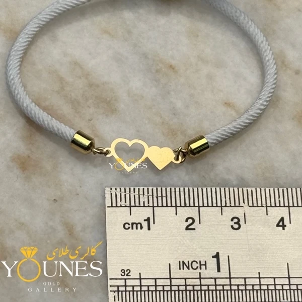 دستبند دو قلب پر و تو خالی طلا لیزری